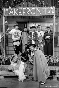 Students in costume pose for a photo at Acalanes High School graduation party