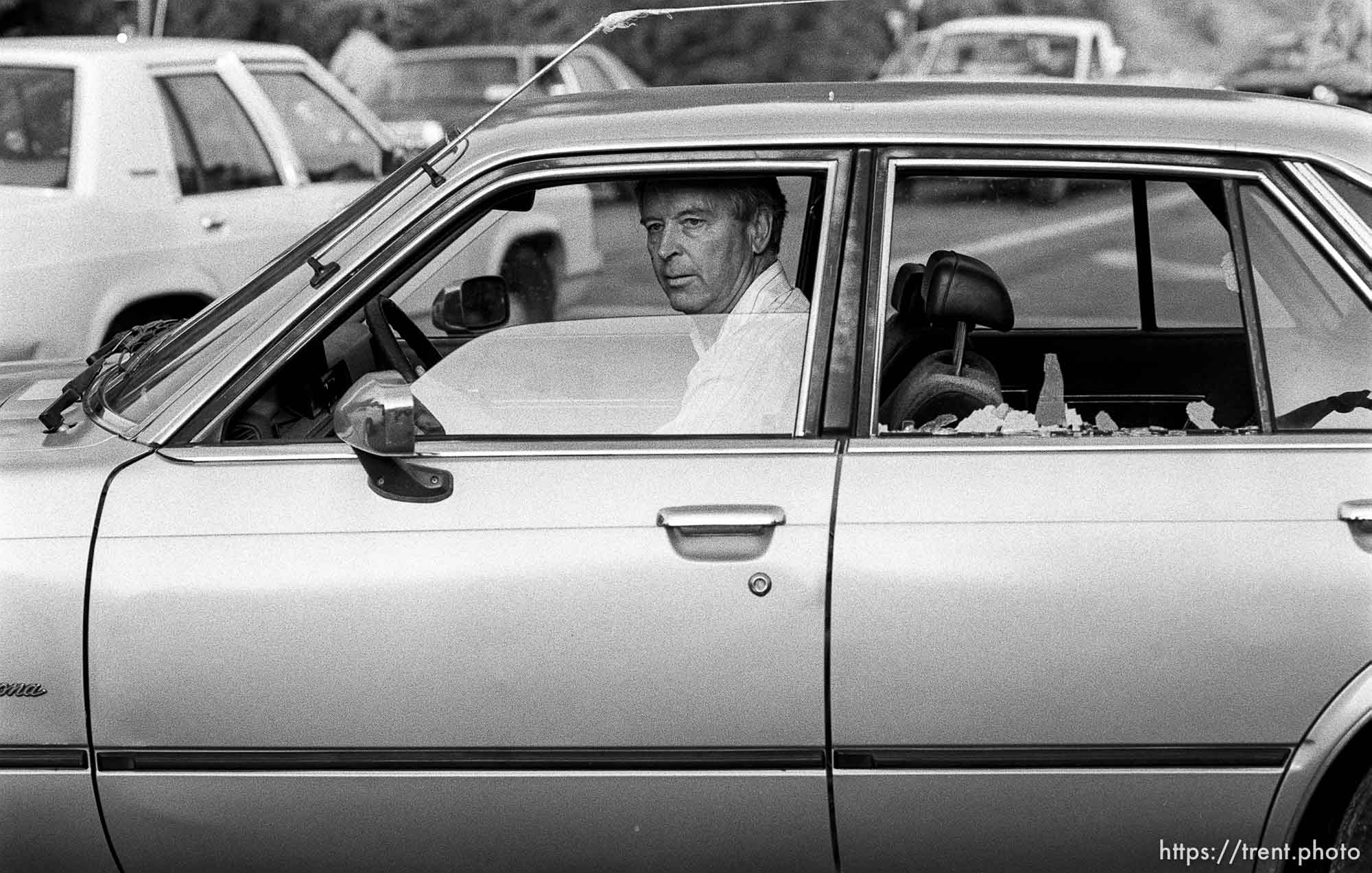 Man angry after protesters broke the window of his car during protests over President George Bush's visit to town.