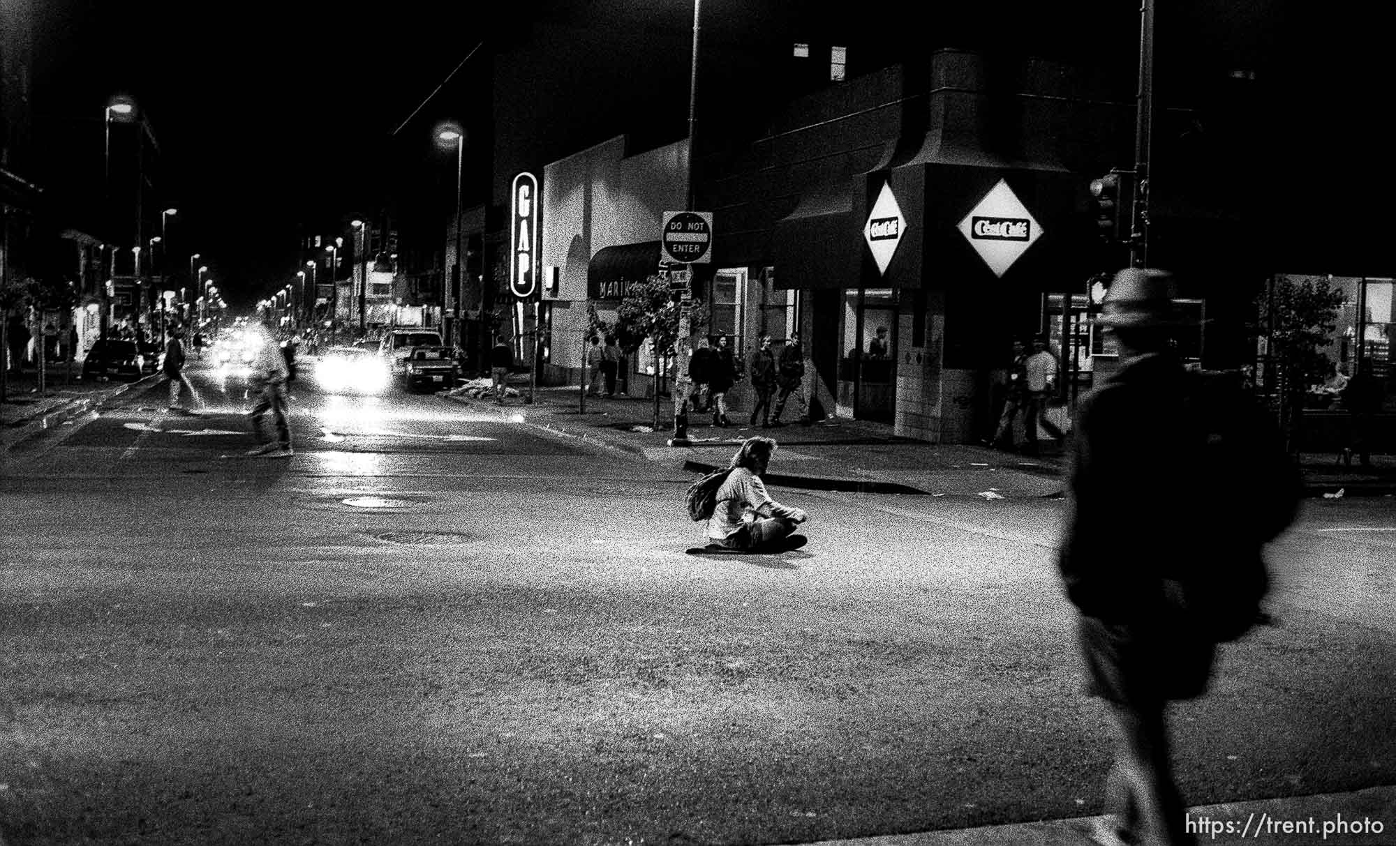 Man sits in the middle of street at Rosebud protest