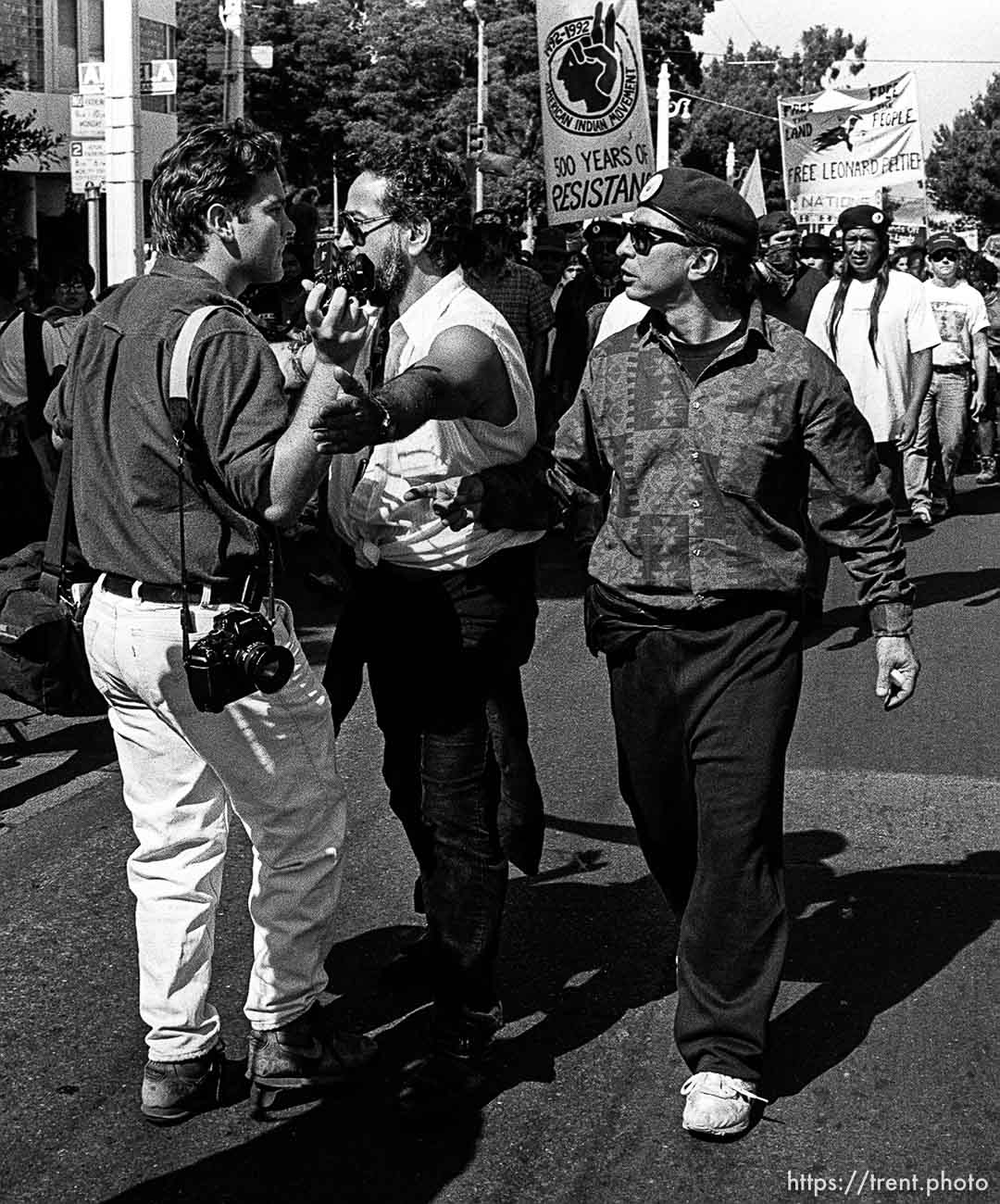 D having trouble with American Indian Movement people at anti-Christopher Columbus protest.