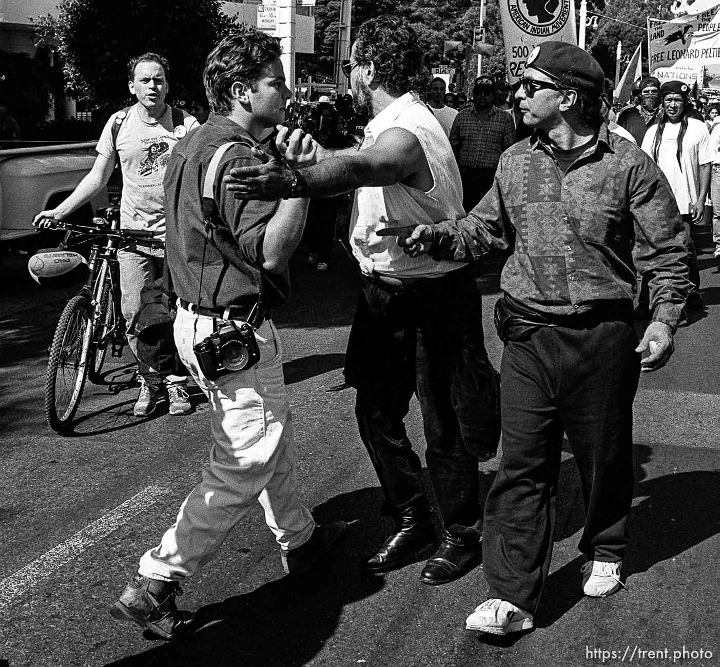 D having trouble with American Indian Movement people at anti-Christopher Columbus protest.