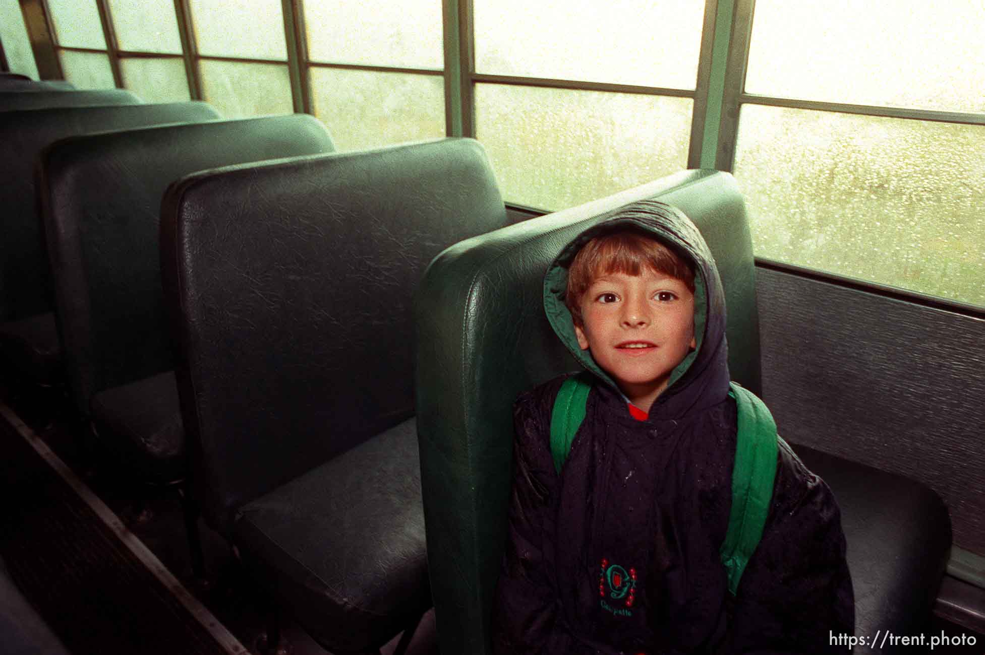 Kid on school bus.