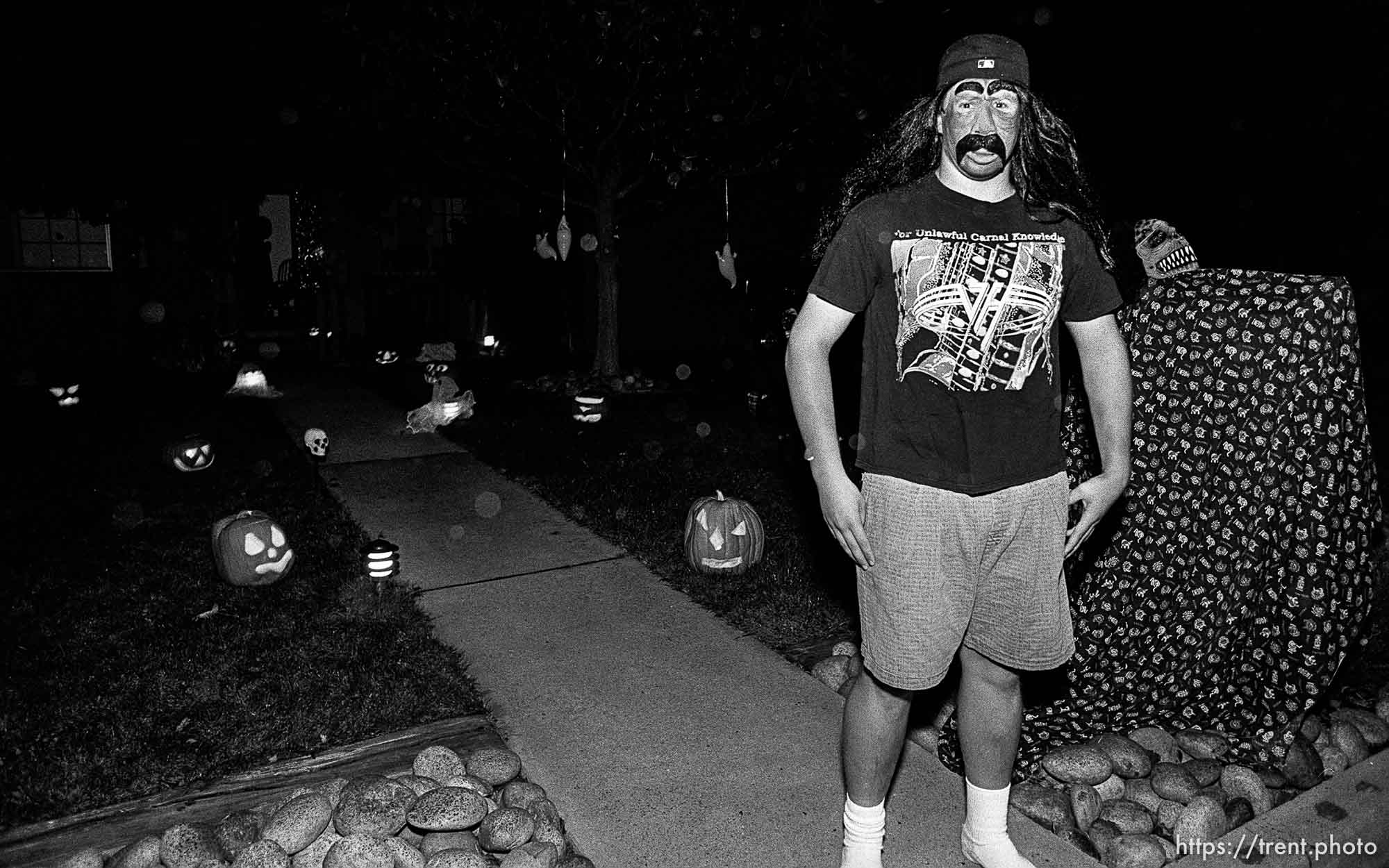 Weird man and pumpkins on Halloween