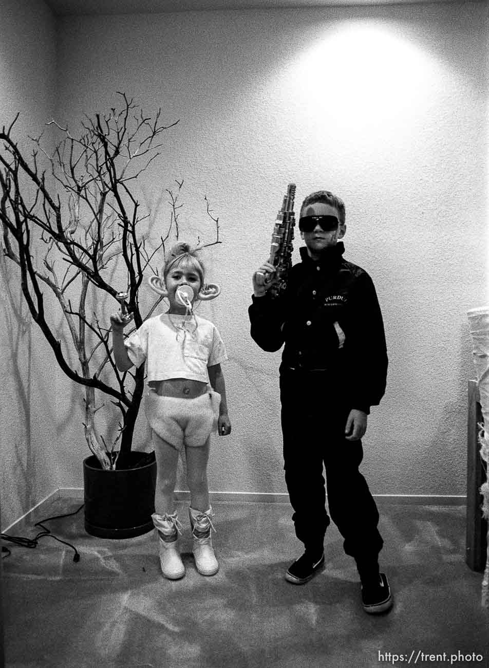 kids dressed up for Halloween. Treasure troll and the Terminator