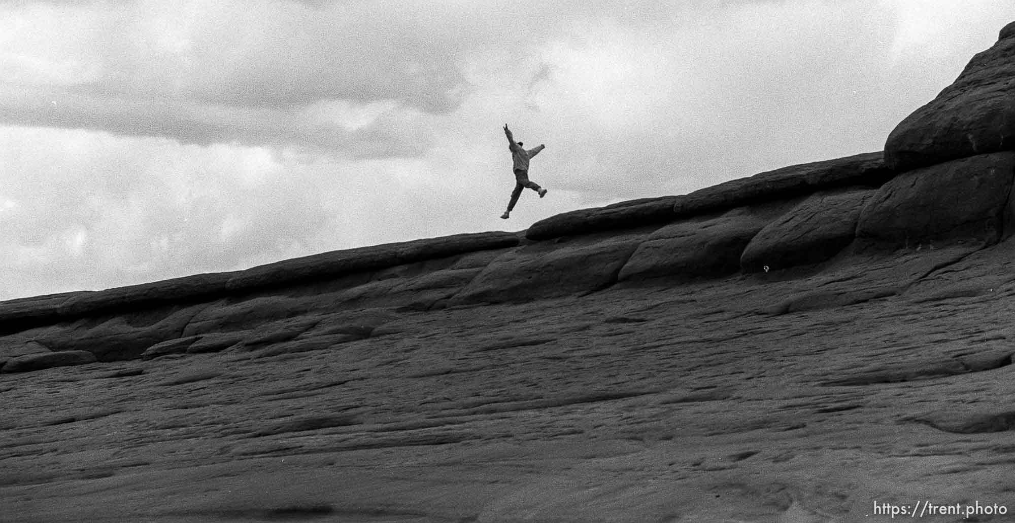 dancing on rock at Arches National Park