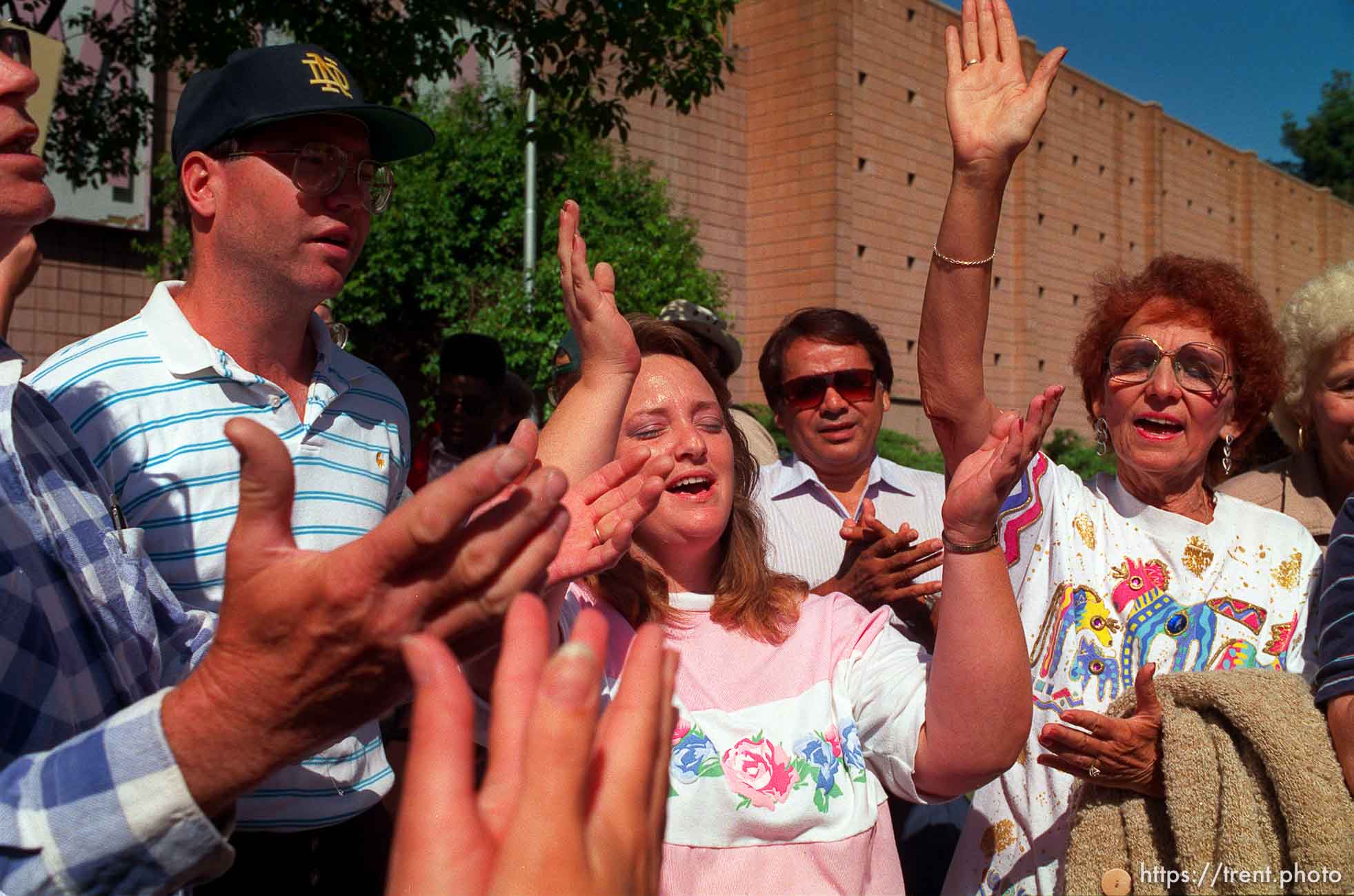 Pro-life people pray at Operation Rescue abortion protest at Planned Parenthood clinic.