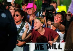 Pro-choice protesters yell at Operation Rescue abortion protest at Planned Parenthood clinic.