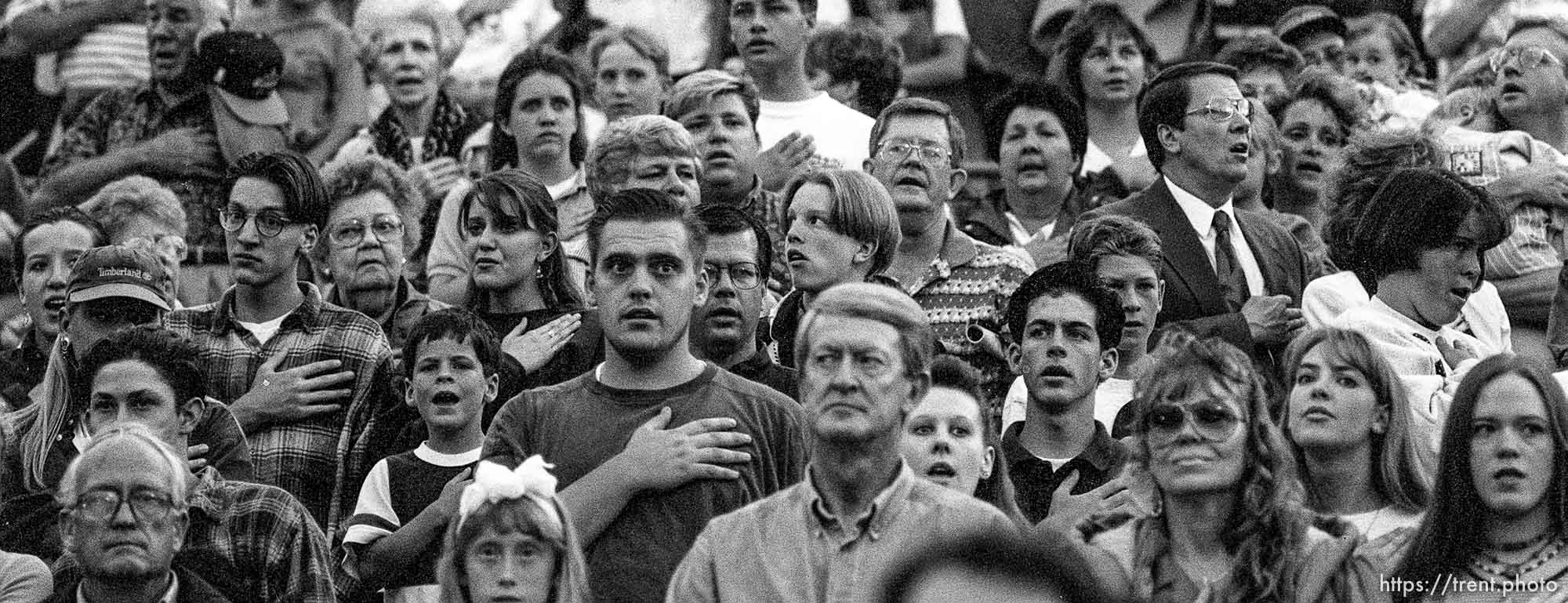 People during national anthem at the Stadium of Fire