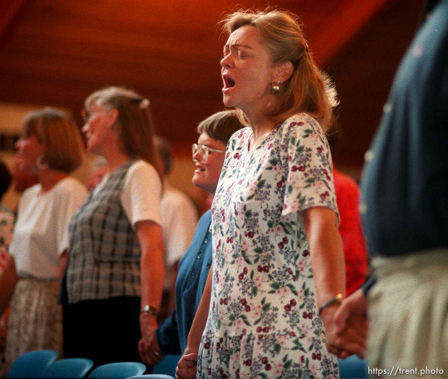 Hand-holding hymns at Unity Church service