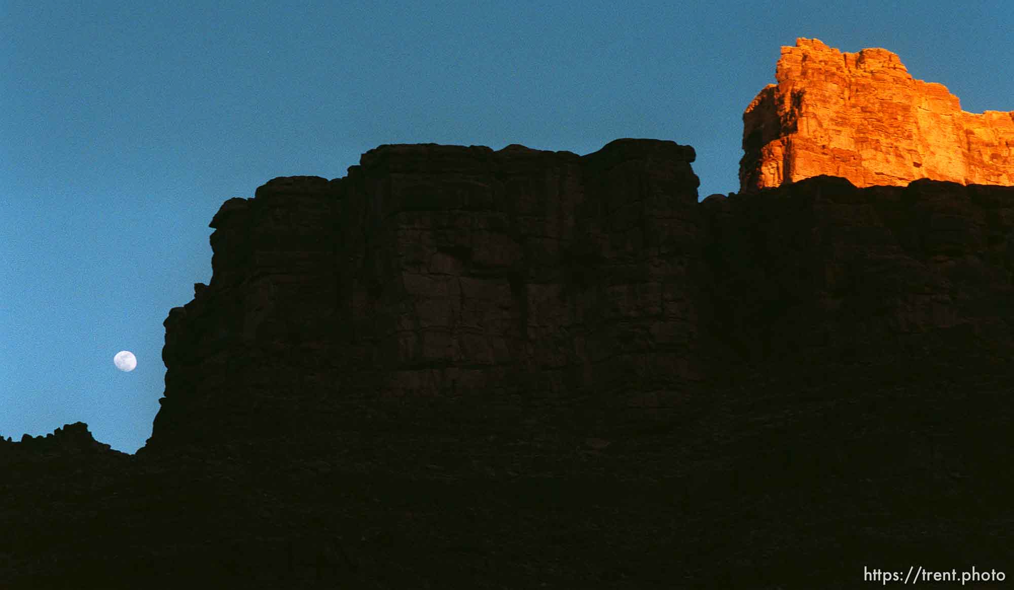 Full moon and canyon walls at sunset. Grand Canyon flood trip.