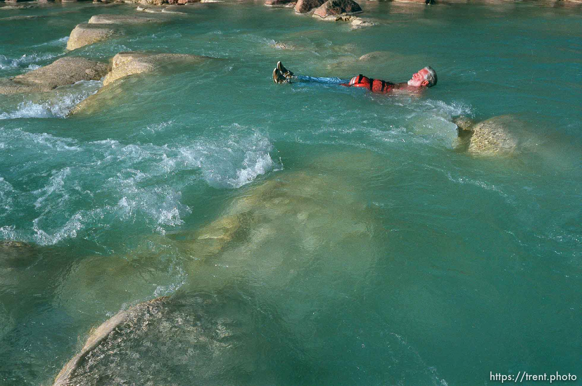 Stan in the blue water of the Little Colorado. Grand Canyon flood trip.