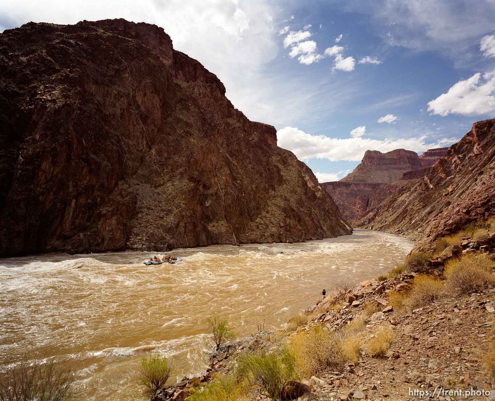 A J-rig raft makes its way down the Colorado River near Crystal Rapid during a man-made flood in the Grand Canyon, March 1996.