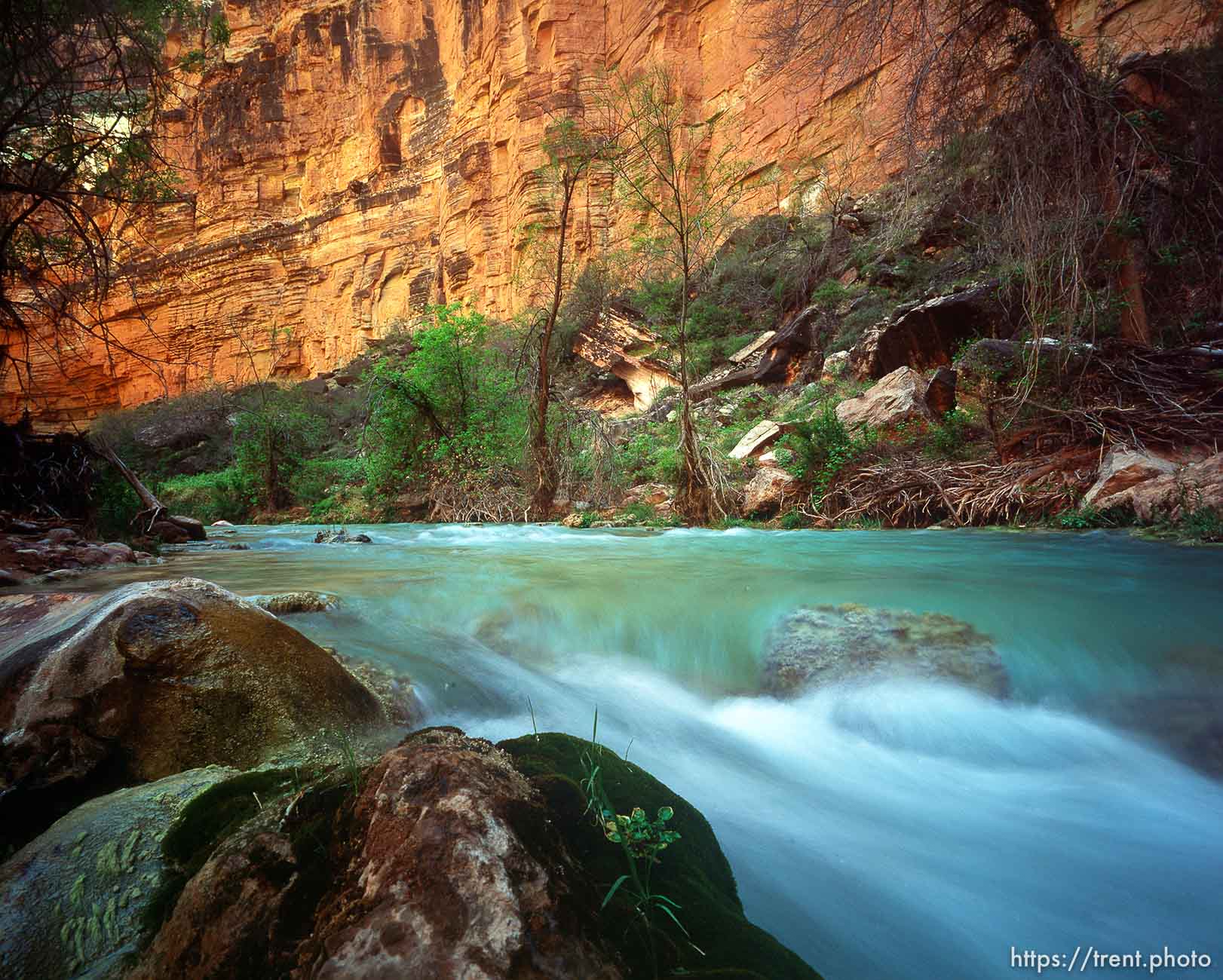 Blue water and canyon walls in Havisu Canyon. Grand Canyon flood trip.