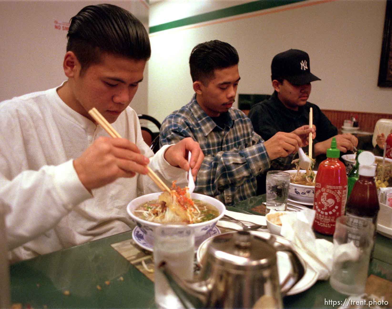 Oriental Posse members, noodles and rice at Cafe Kim.