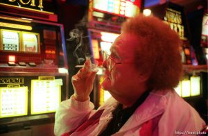 Woman gambling and smoking on wendover trip with nursing home