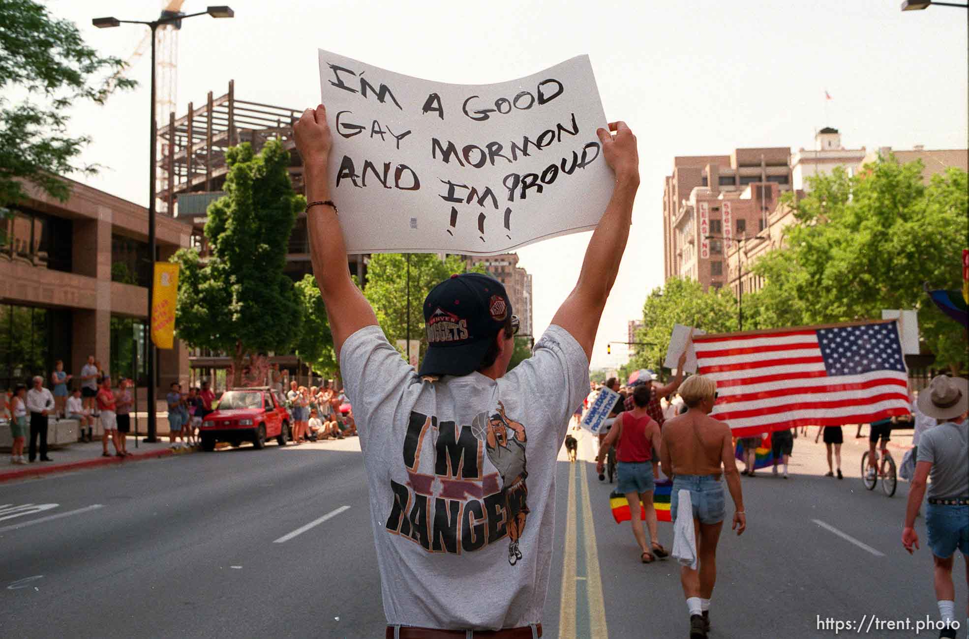 phony sign in gay pride parade.