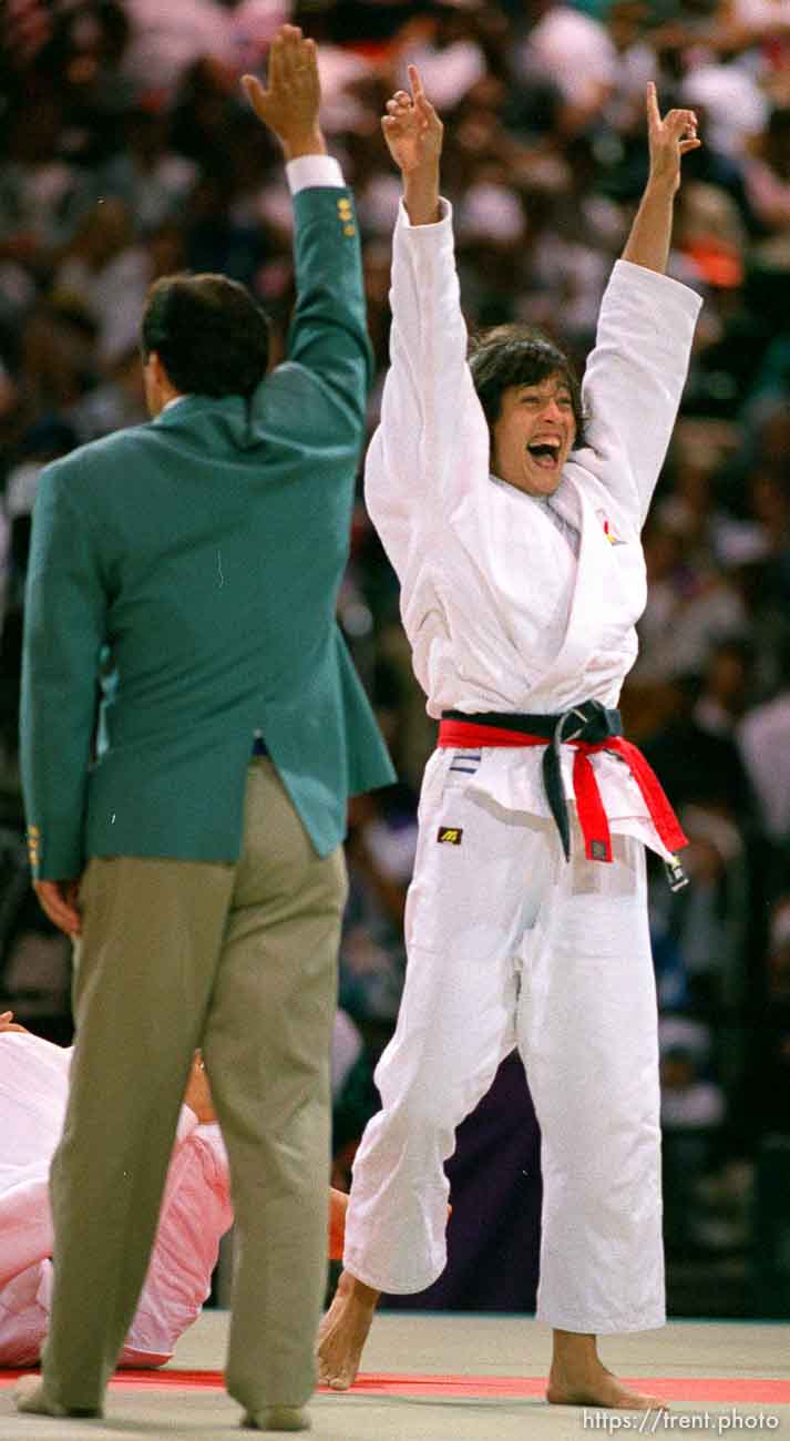 Woman wins gold medal in Judo at the 1996 Summer Olympic Games