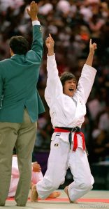 Woman wins gold medal in Judo at the 1996 Summer Olympic Games