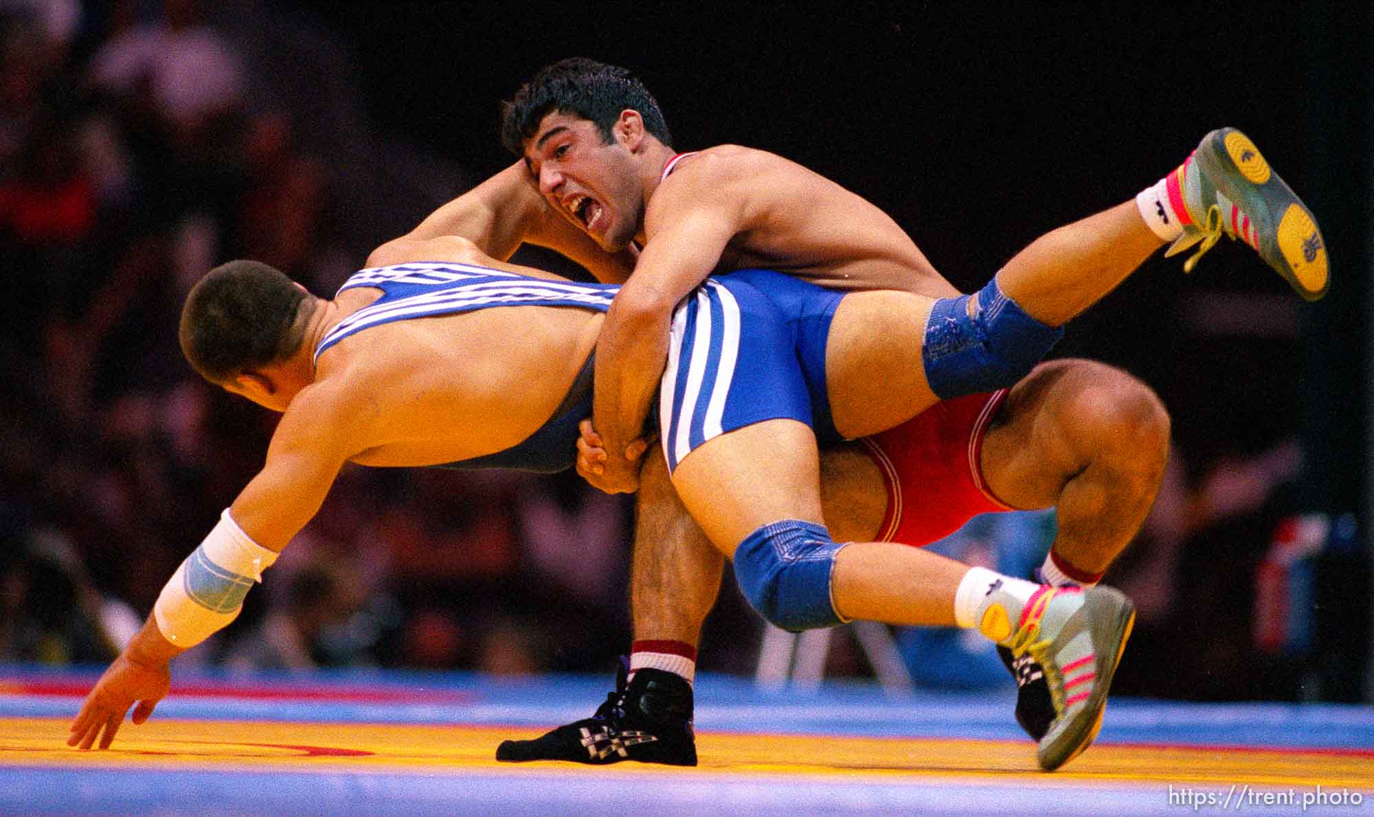 Wrestling at the 1996 Summer Olympic Games. Blue: Thomas Zander (GERMANY). Red: Hamza Yerlikaya (TURKEY)