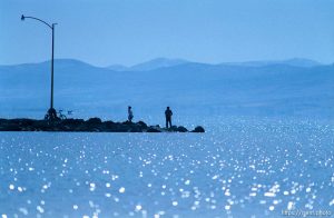 Couple on pier at Utah Lake.