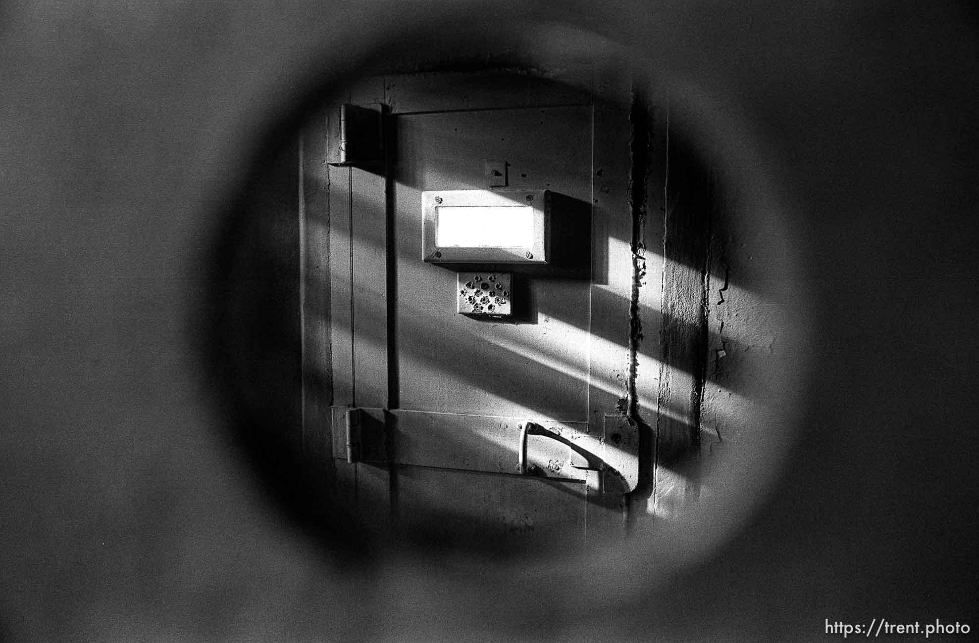 Door seen through gun hole at Alcatraz