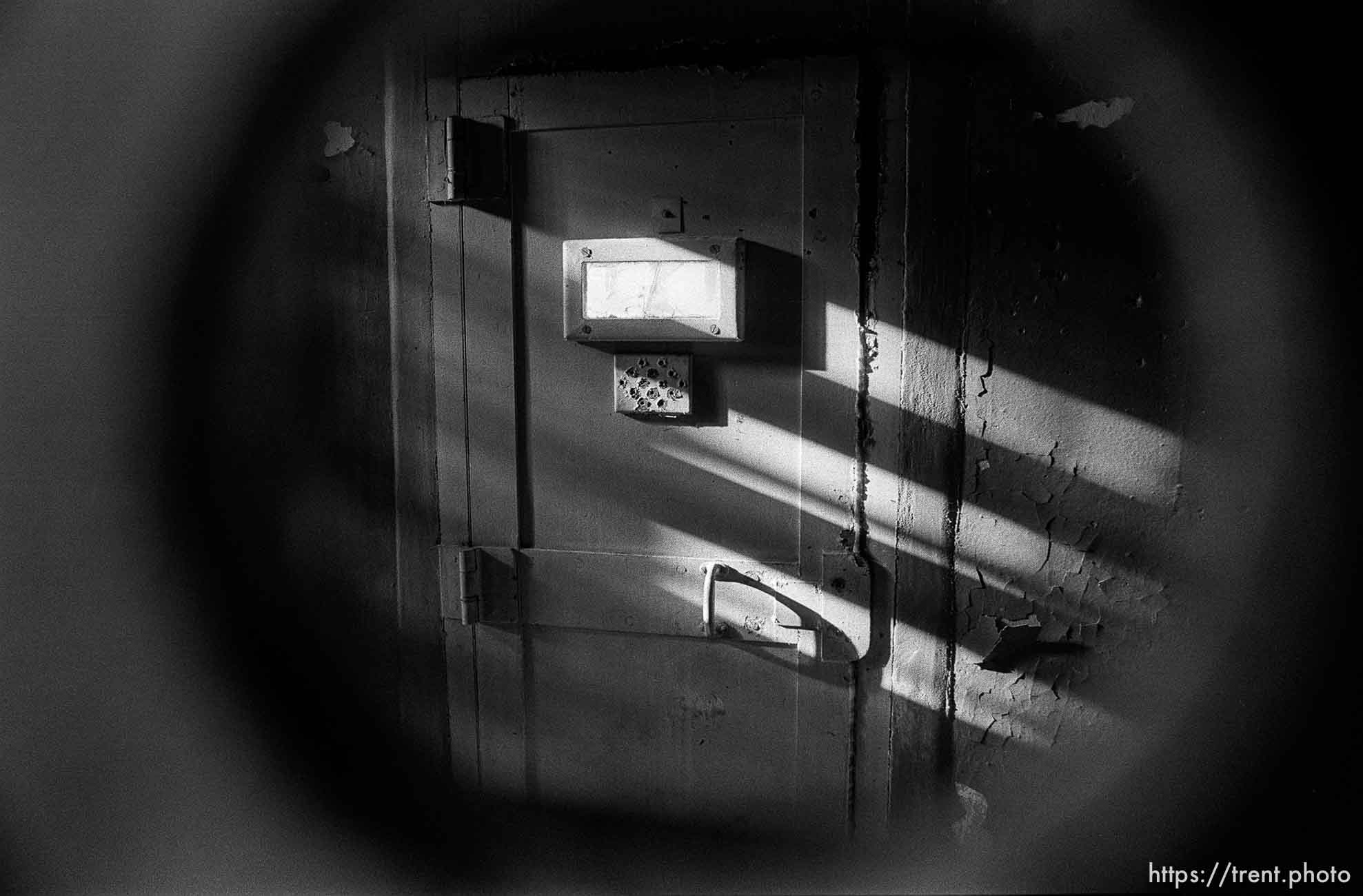 Door seen through gun hole at Alcatraz