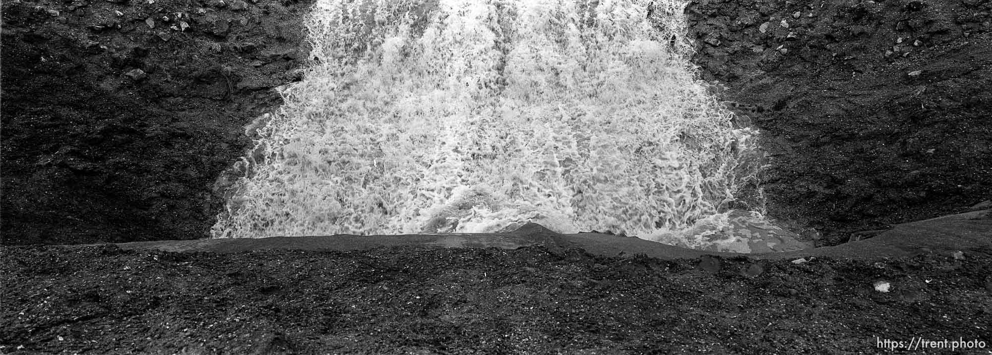 View of San Ramon Creek, water rushing into tunnel