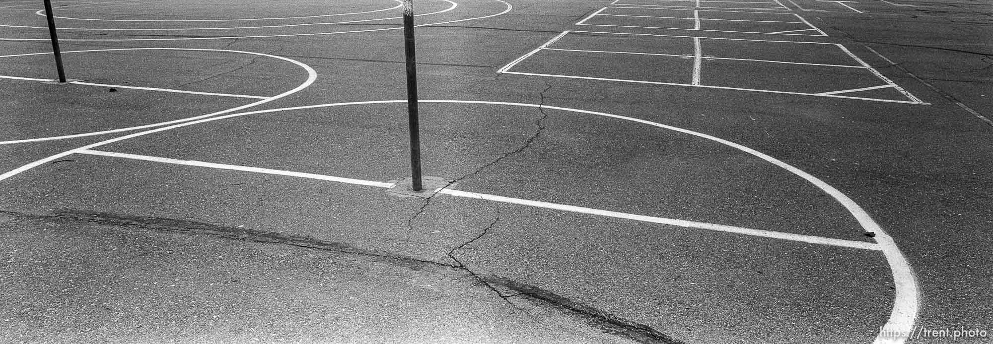 Lines on playground for tether-ball, four-square at Walt Disney Elementary School.