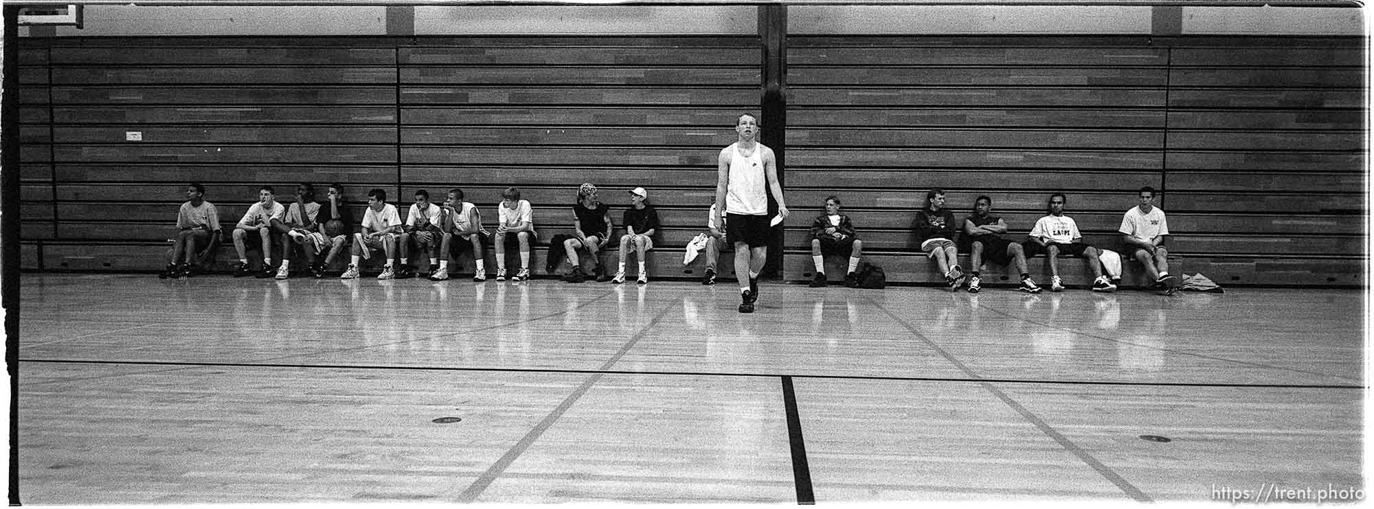 Basketball players wait for their games during the Hoop Fest 3-on-3 Basketball Tournament at the Deseret Gym.