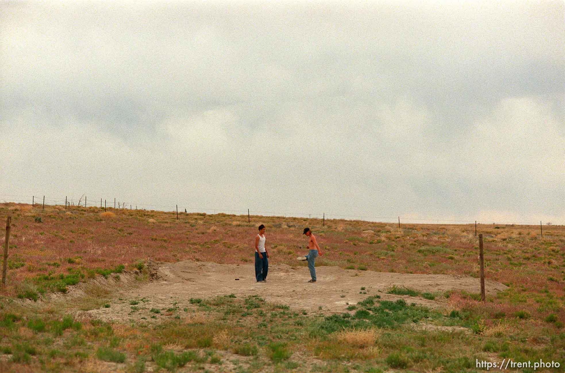 Lutua Westley and Chad Anderson (right) play a game of hackey-sack at Iosepa, which was a colony of Polynesian members of the LDS church in the late 1800's. Every year, descendants of the settlers gather to clean up the Iosepa cemetery and teach the youth about their ancestors.