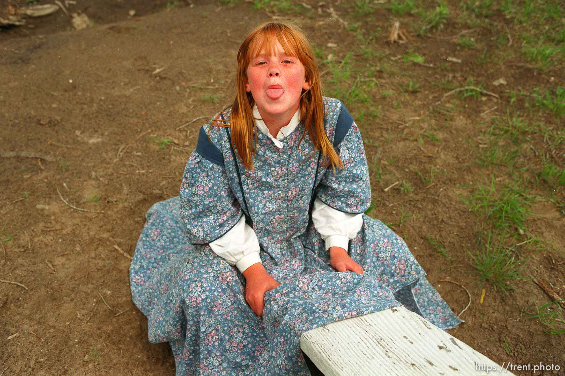 Kimberly Starling, 10, on a teeter-totter at a school playground.