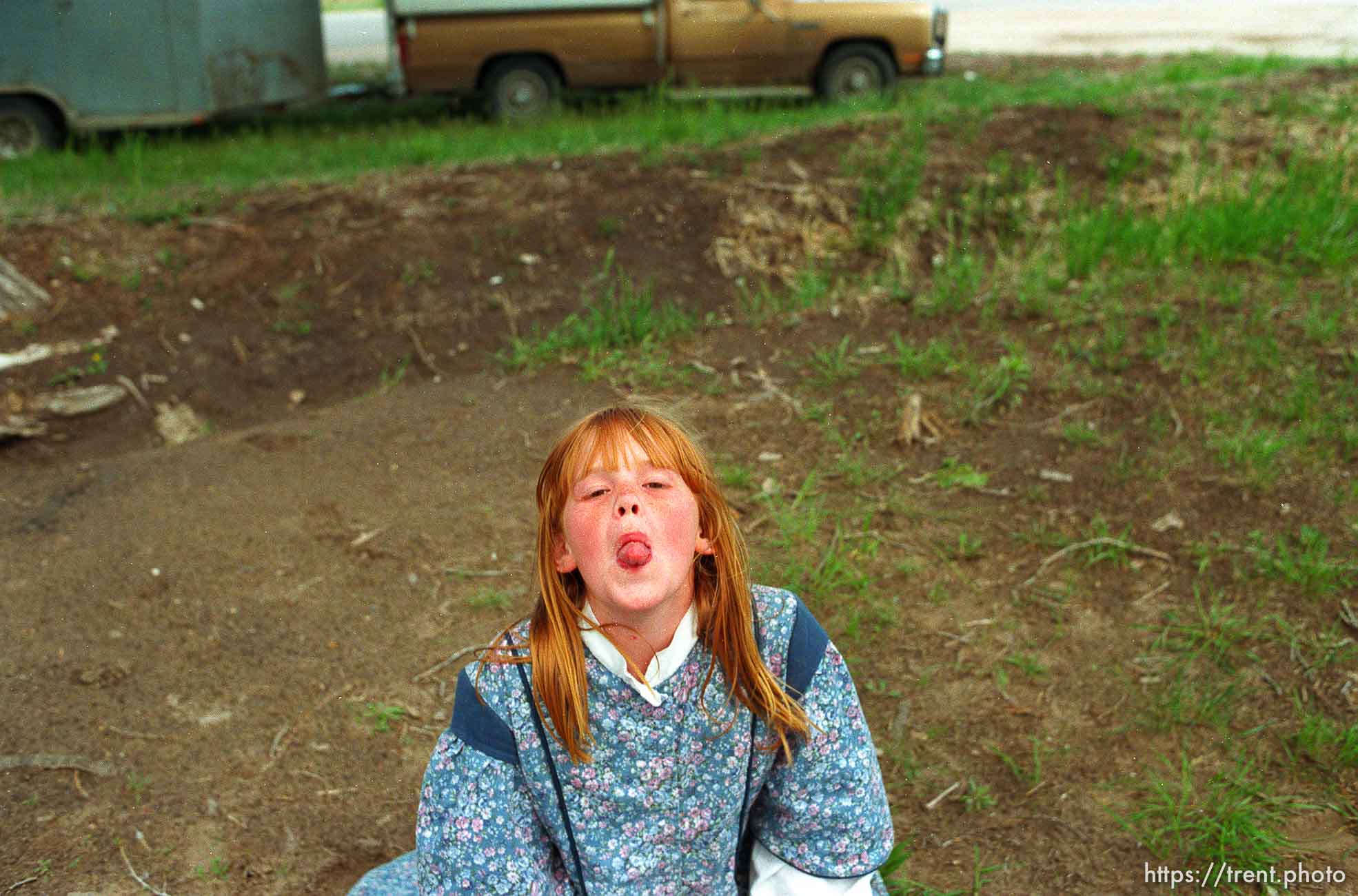 Kimberly Starling, 10, on a teeter-totter at a school playground.