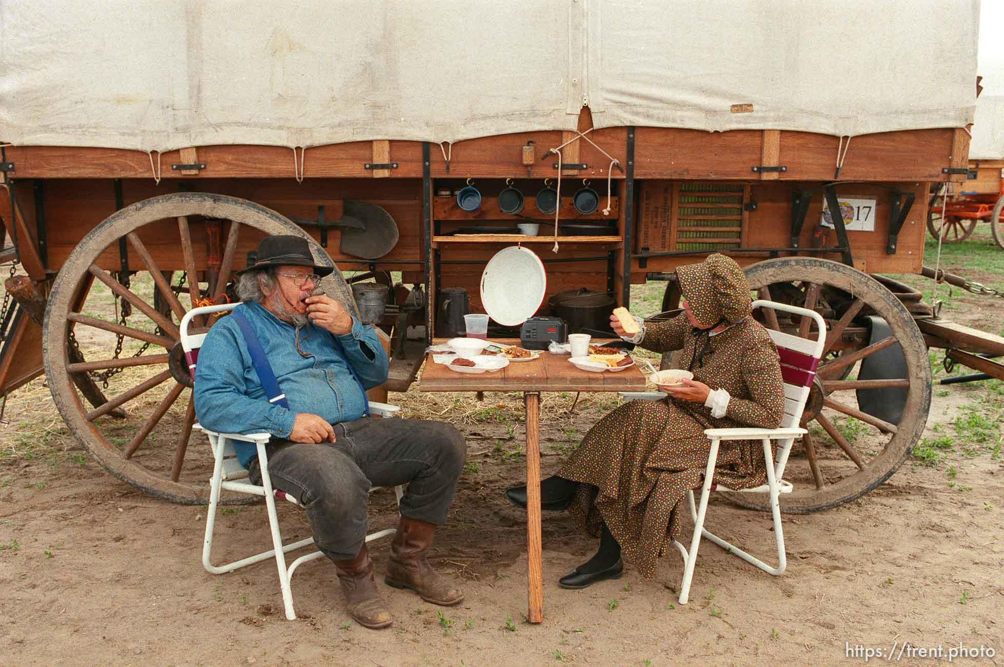 Charles and Mary Quillin, New Sharon, LA eating in camp on the Mormon Trail Wagon Train.