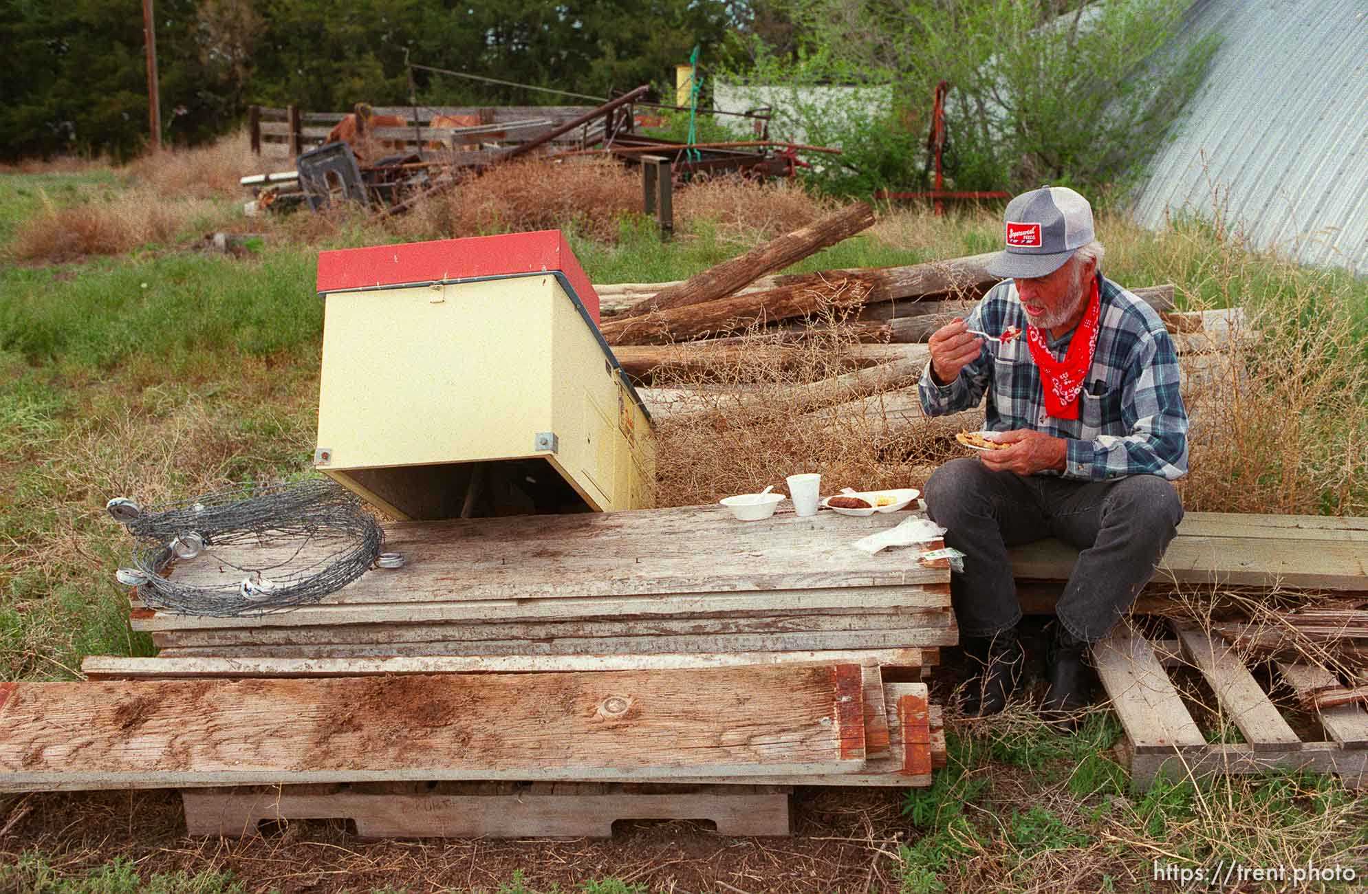 Floyd Hohl, Donnelson, IA, has been on the train since Nauvoo (not JL2, then south group). Here he eats pie in camp on the Mormon Trail Wagon Train.