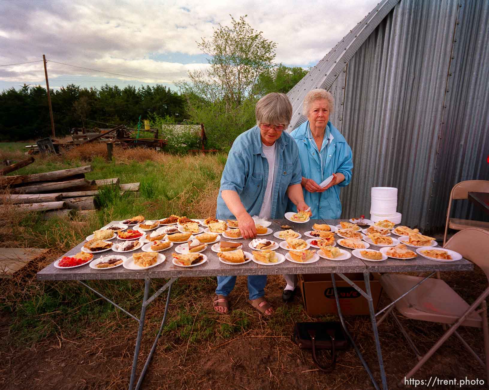 Donna Nelson & Lena Middleton serving up pie for a dollar at the Ham & Bean fundraiser dinner along the Mormon Trail. The fundraiser was for Susan Siffring, who has lukemia and just underwent a bone marrow transplant operation.