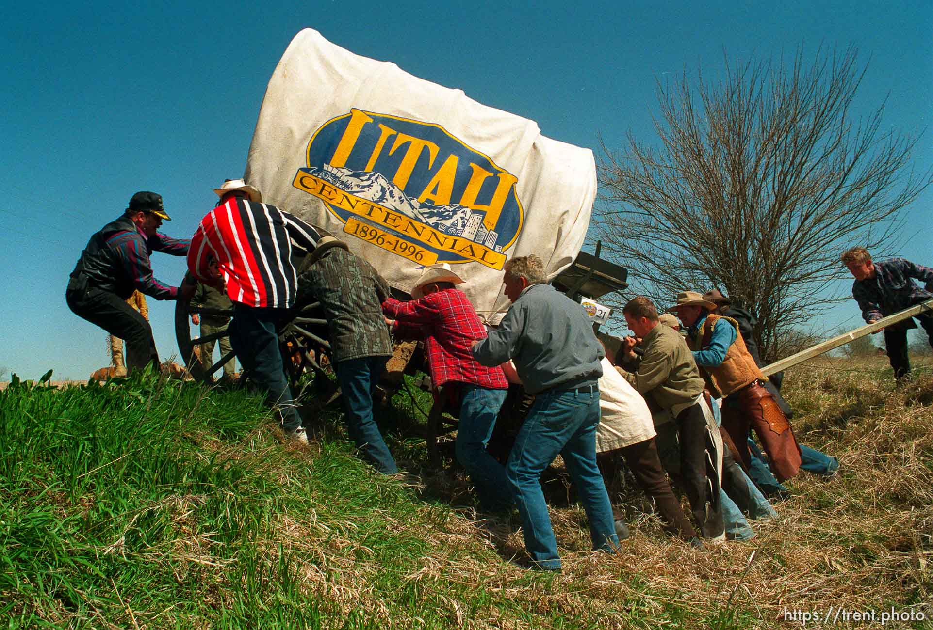 People pull the Utah Centennial Wagon out of a ditch at the Mormon Pioneer Wagon Train re-enactment.