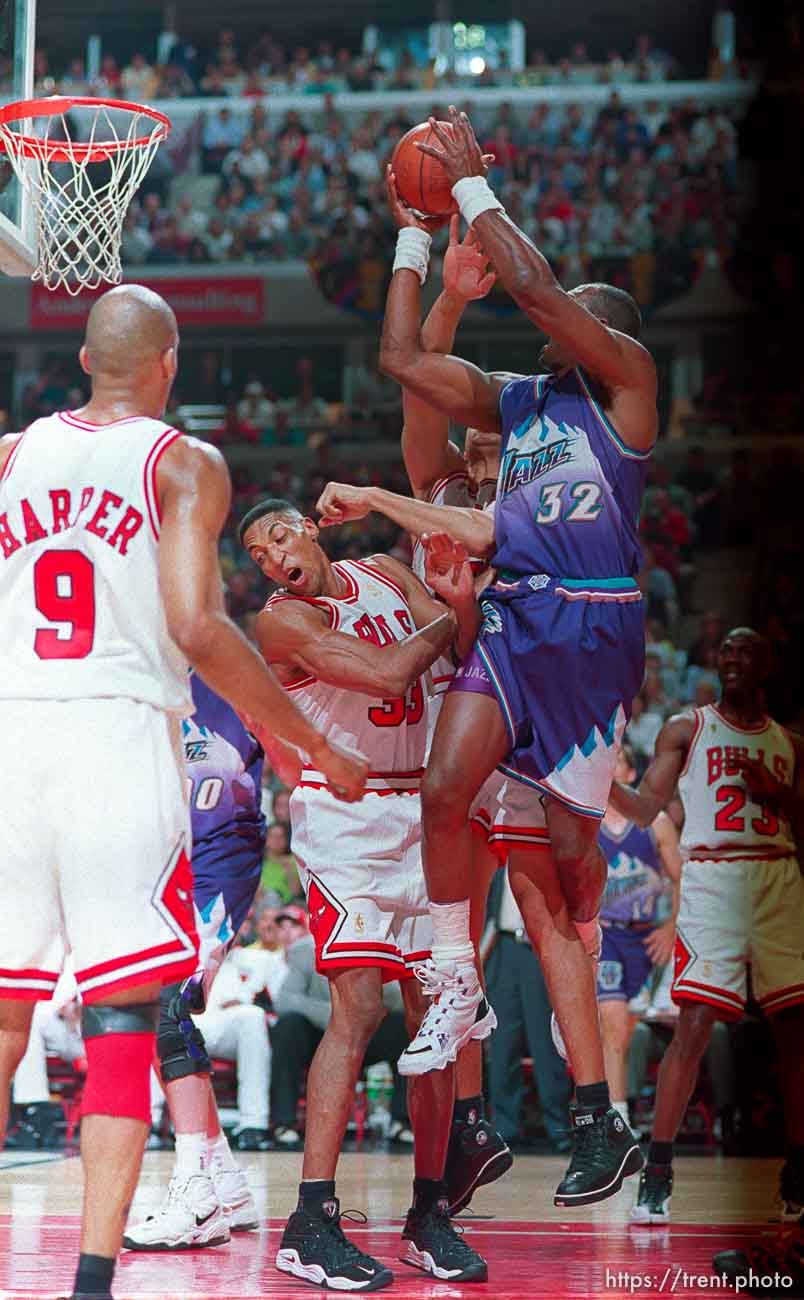 Utah's Karl Malone tries to shoot over Chicago's Scottie Pippen at game 6, NBA Finals, Utah Jazz vs Chicago Bulls. Bulls won this game to win their fifth NBA Championship in the Michael Jordan era.