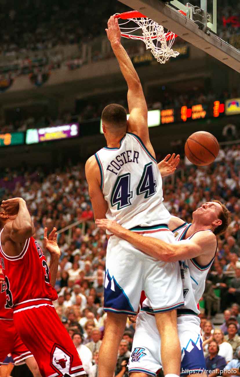 Utah's Greg Foster dunks ball on Utah's Adam Keefe at the NBA Finals Game three, Utah Jazz vs Chicago Bulls.