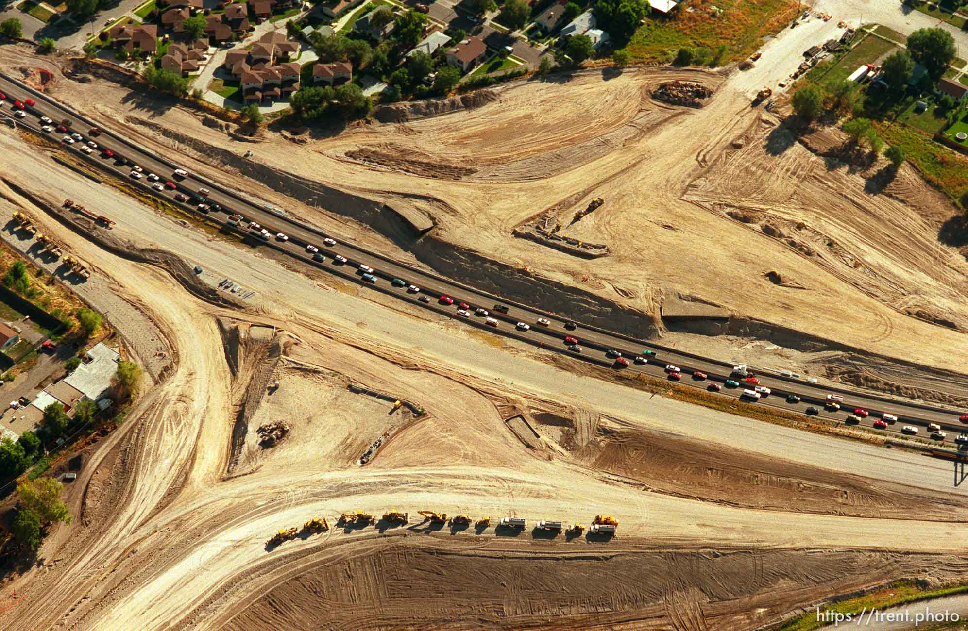 6th North interchange on I-15 under construction during rush hour shot from the air.