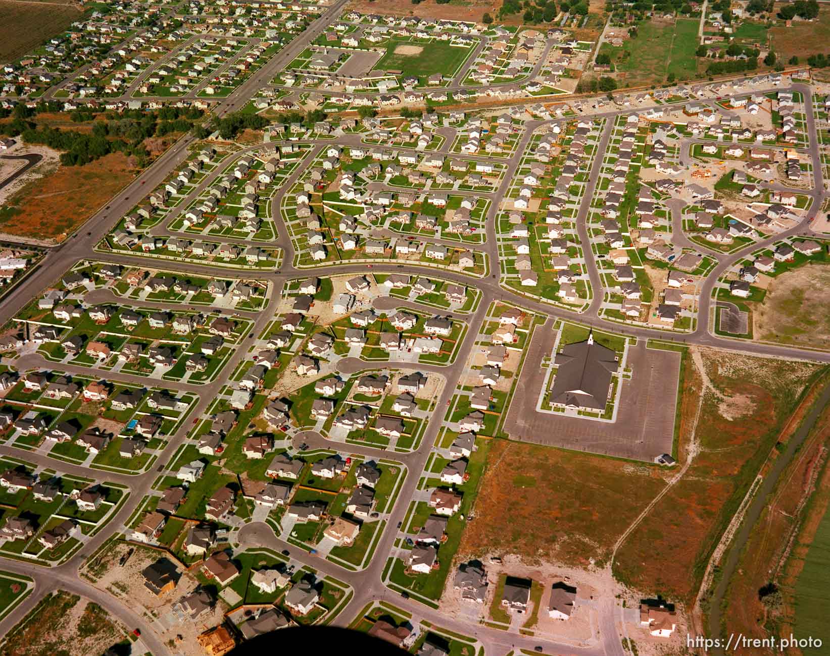 Suburban neighborhood and church from the air.