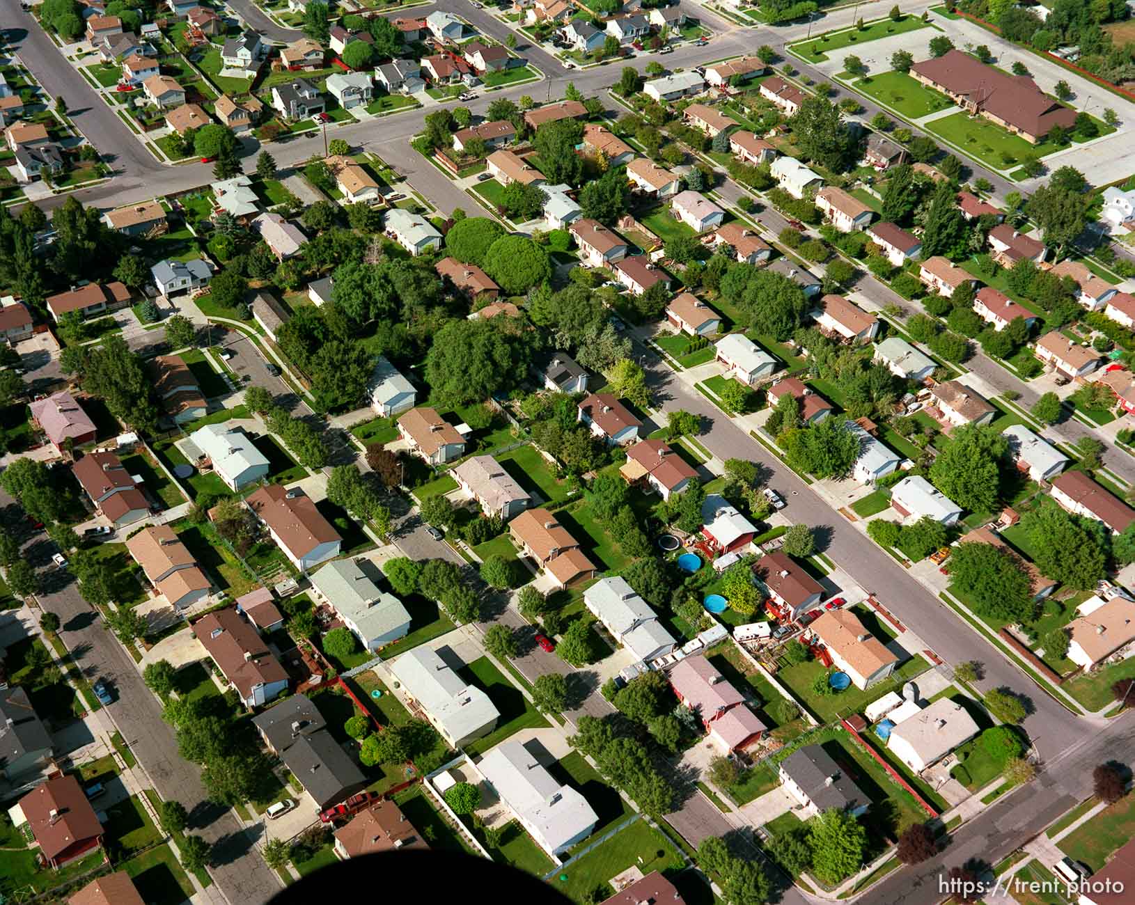 Suburban neighborhood with church (top right) shot from the air.