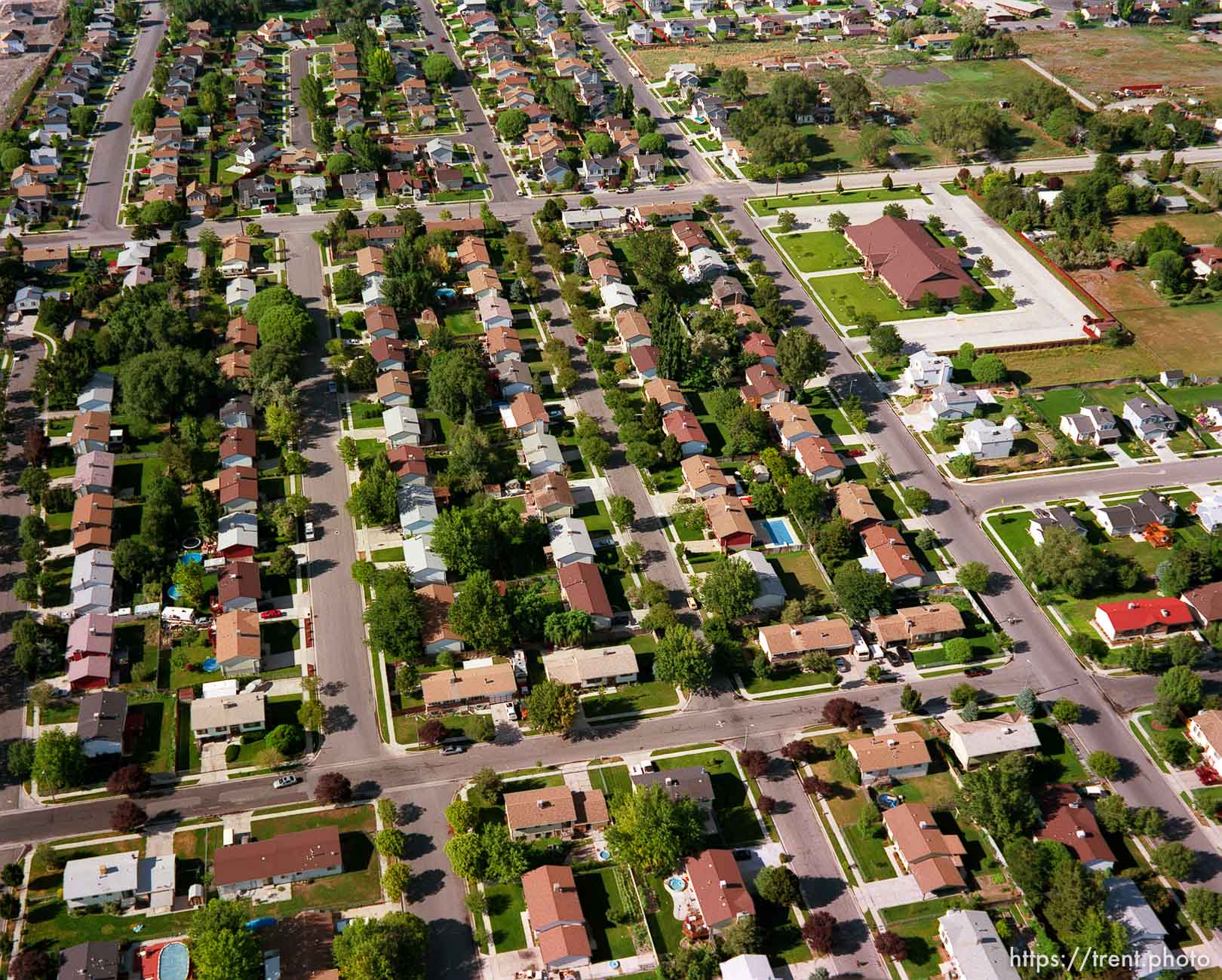 Suburban neighborhood with church (top right) shot from the air.