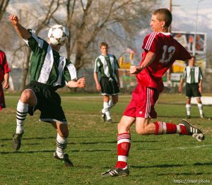 Mountain View HS at Hillcrest HS soccer. Ball head. Hillcrest's James Crowley (left) and MV's Brad or Tim Johnson (there were two #13's).