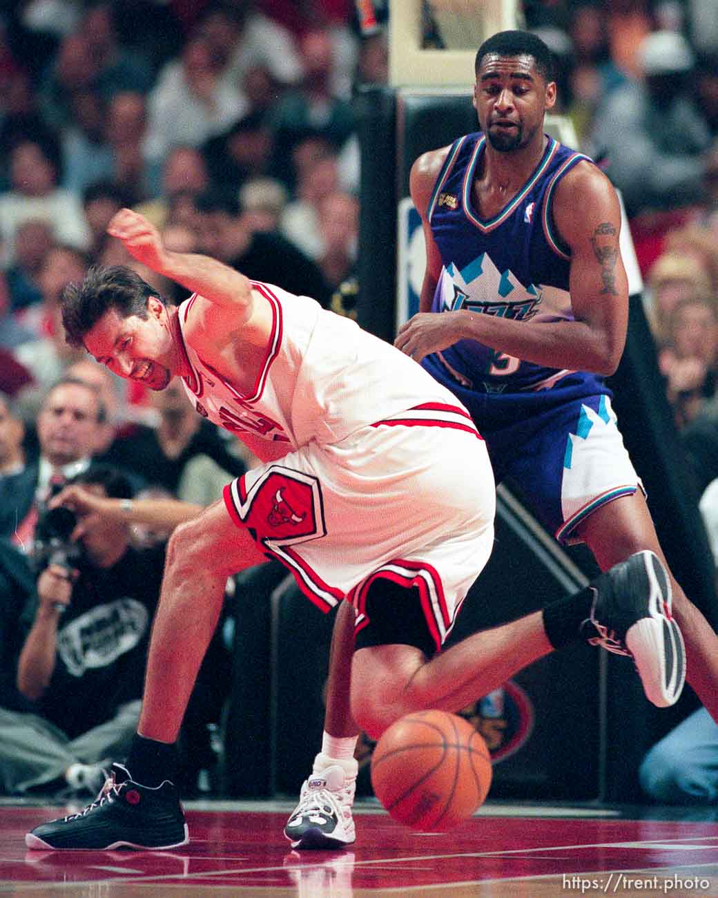 Toni Kukoc loses the ball at Jazz vs. Bulls, game 5 of the NBA Finals. Jazz won. Chris Morris behind