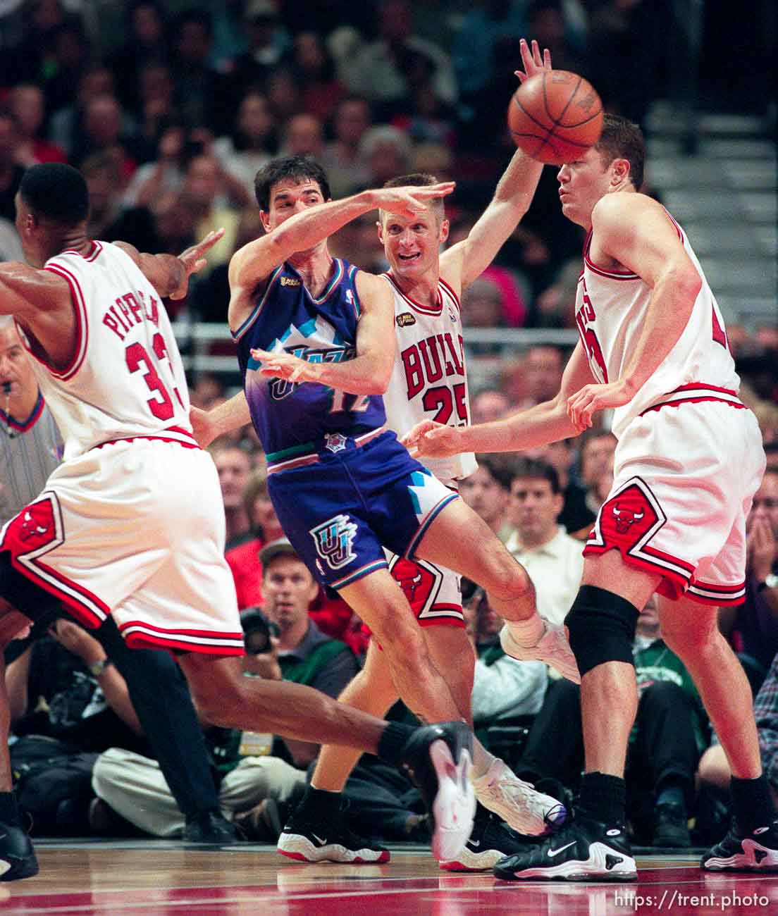 John Stockton passes in traffic at Jazz vs. Bulls, game 5 of the NBA Finals. Jazz won