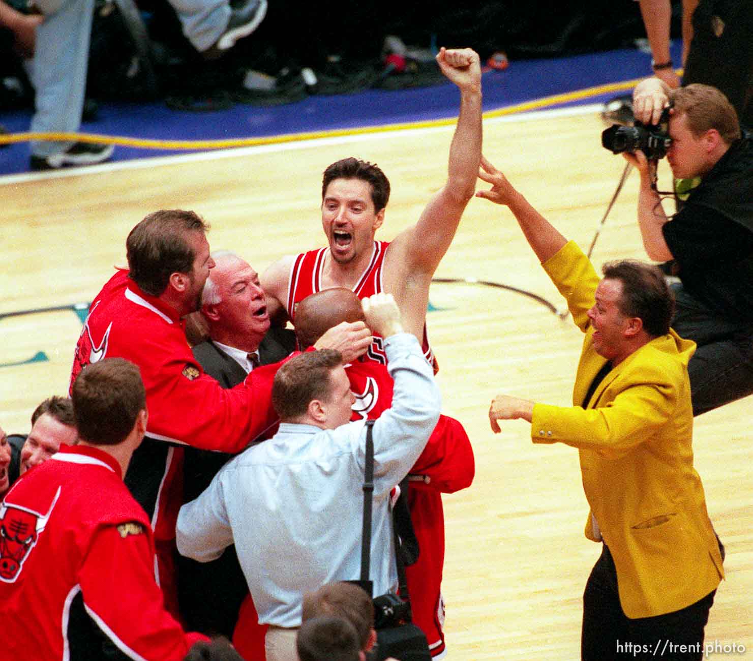 Toni Kukoc and teammates celebrate NBA Championship at Jazz vs. Bulls, game 6 of the NBA Finals. Bulls won