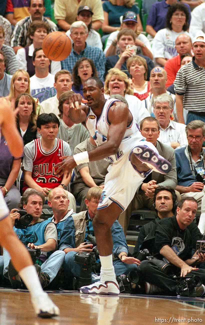 Karl Malone saves a ball as he goes out of bounds at Jazz vs. Bulls, game 1 of the NBA Finals. Jazz won