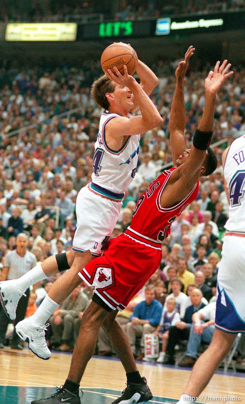 Jeff Hornacek drives over Scottie Pippen at Jazz vs. Bulls, game 1 of the NBA Finals. Jazz won