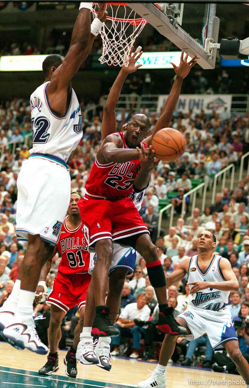 Michael Jordan drives at Karl Malone at Jazz vs. Bulls, game 1 of the NBA Finals. Jazz won