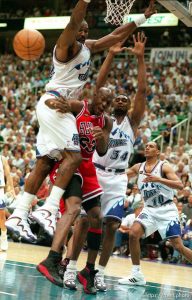 Michael Jordan passes through Karl Malone and Chris Morris at Jazz vs. Bulls, game 1 of the NBA Finals. Jazz won